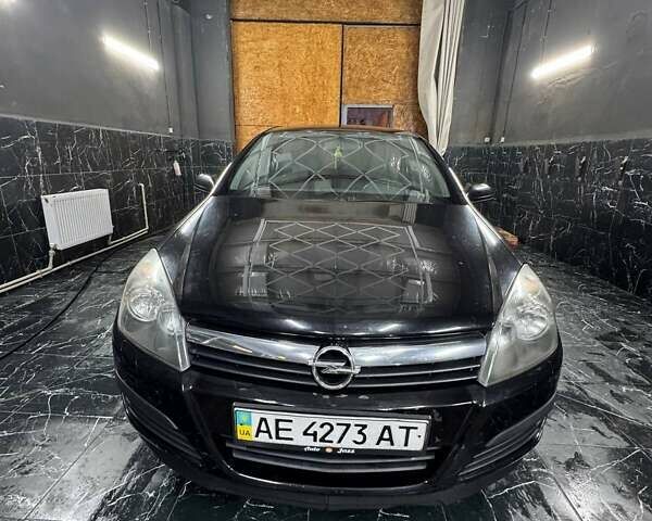 Черный Опель Астра, объемом двигателя 1.4 л и пробегом 219 тыс. км за 5000 $, фото 3 на Automoto.ua