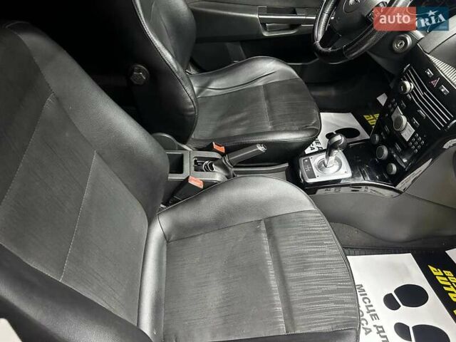 Черный Опель Астра, объемом двигателя 1.6 л и пробегом 213 тыс. км за 4300 $, фото 14 на Automoto.ua