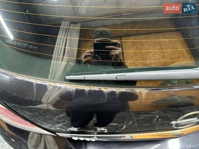 Черный Опель Астра, объемом двигателя 1.4 л и пробегом 219 тыс. км за 5000 $, фото 15 на Automoto.ua