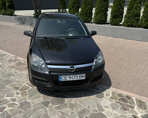 Черный Опель Астра, объемом двигателя 1.36 л и пробегом 220 тыс. км за 4450 $, фото 5 на Automoto.ua