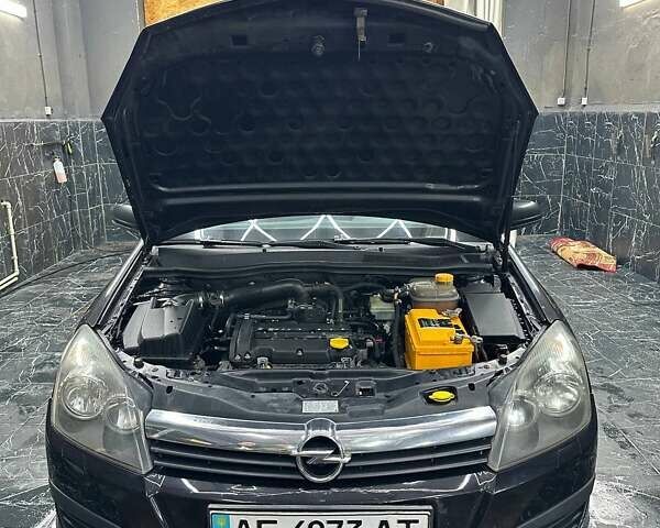 Черный Опель Астра, объемом двигателя 1.4 л и пробегом 219 тыс. км за 5000 $, фото 11 на Automoto.ua