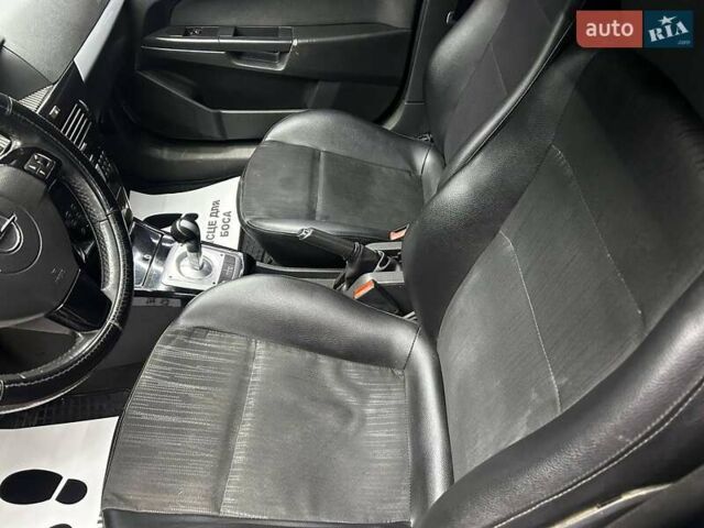 Черный Опель Астра, объемом двигателя 1.6 л и пробегом 213 тыс. км за 4300 $, фото 8 на Automoto.ua