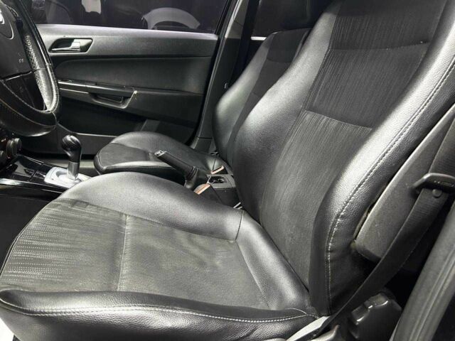 Черный Опель Астра, объемом двигателя 1.6 л и пробегом 213 тыс. км за 4300 $, фото 7 на Automoto.ua