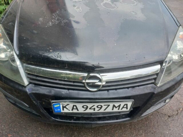 Черный Опель Астра, объемом двигателя 1.8 л и пробегом 170 тыс. км за 5000 $, фото 2 на Automoto.ua