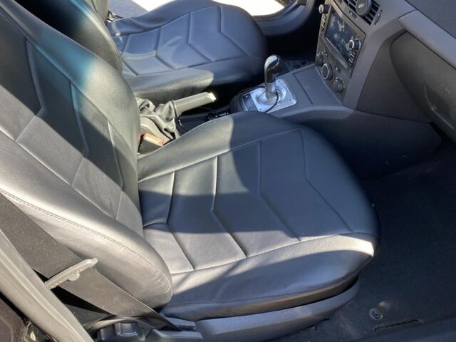 Черный Опель Астра, объемом двигателя 1.4 л и пробегом 200 тыс. км за 4000 $, фото 4 на Automoto.ua