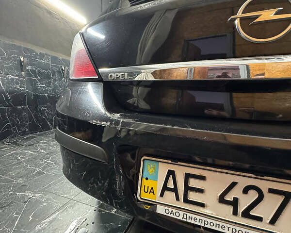 Черный Опель Астра, объемом двигателя 1.4 л и пробегом 220 тыс. км за 4700 $, фото 5 на Automoto.ua
