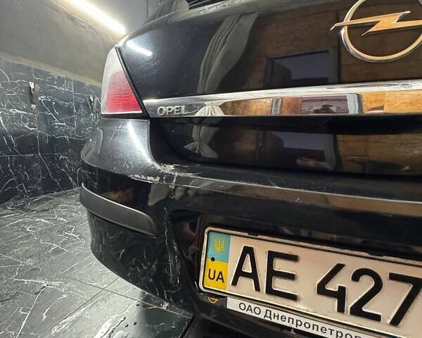 Черный Опель Астра, объемом двигателя 1.4 л и пробегом 219 тыс. км за 5000 $, фото 6 на Automoto.ua