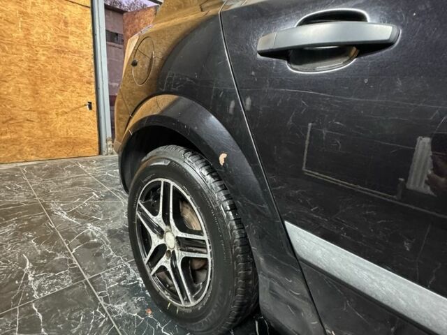 Черный Опель Астра, объемом двигателя 1.4 л и пробегом 220 тыс. км за 4500 $, фото 3 на Automoto.ua