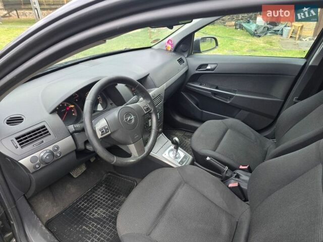 Черный Опель Астра, объемом двигателя 1.4 л и пробегом 210 тыс. км за 5200 $, фото 7 на Automoto.ua