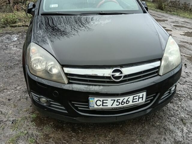 Черный Опель Астра, объемом двигателя 1 л и пробегом 184 тыс. км за 3600 $, фото 3 на Automoto.ua