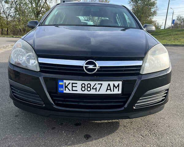 Черный Опель Астра, объемом двигателя 1.6 л и пробегом 247 тыс. км за 4800 $, фото 4 на Automoto.ua