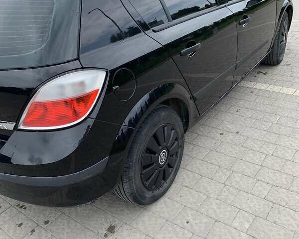 Черный Опель Астра, объемом двигателя 1.4 л и пробегом 199 тыс. км за 3700 $, фото 8 на Automoto.ua