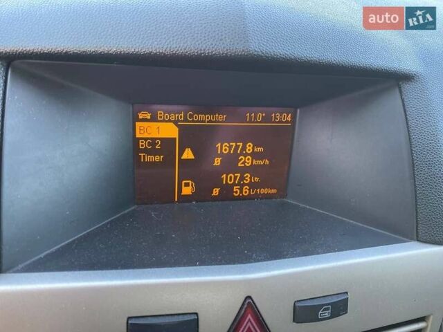 Черный Опель Астра, объемом двигателя 1.3 л и пробегом 227 тыс. км за 4600 $, фото 20 на Automoto.ua