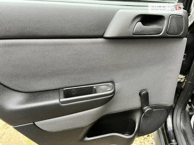 Черный Опель Астра, объемом двигателя 1.36 л и пробегом 82 тыс. км за 4000 $, фото 22 на Automoto.ua