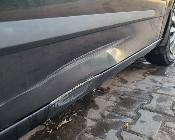 Черный Опель Астра, объемом двигателя 1.4 л и пробегом 254 тыс. км за 3700 $, фото 3 на Automoto.ua
