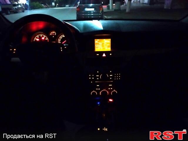 Черный Опель Астра, объемом двигателя 1.6 л и пробегом 200 тыс. км за 4999 $, фото 3 на Automoto.ua