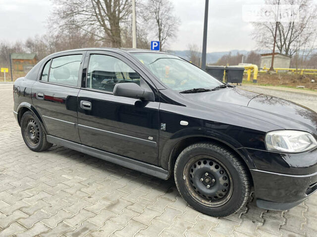 Черный Опель Астра, объемом двигателя 1.36 л и пробегом 82 тыс. км за 4000 $, фото 9 на Automoto.ua