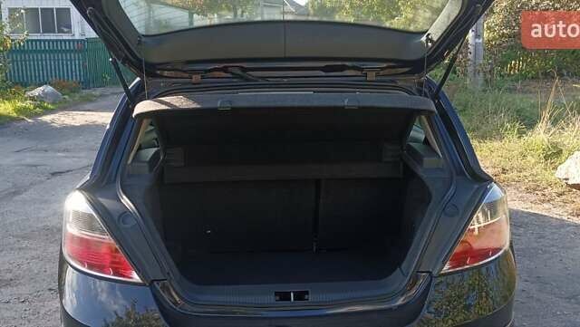 Черный Опель Астра, объемом двигателя 1.6 л и пробегом 203 тыс. км за 5850 $, фото 7 на Automoto.ua