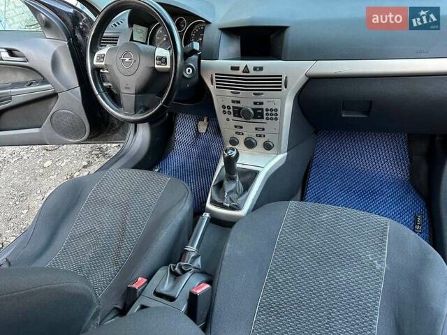 Черный Опель Астра, объемом двигателя 1.3 л и пробегом 227 тыс. км за 4600 $, фото 25 на Automoto.ua