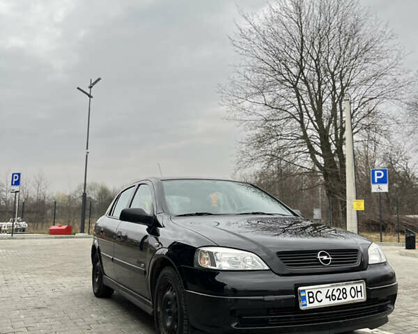 Черный Опель Астра, объемом двигателя 1.36 л и пробегом 82 тыс. км за 4000 $, фото 3 на Automoto.ua