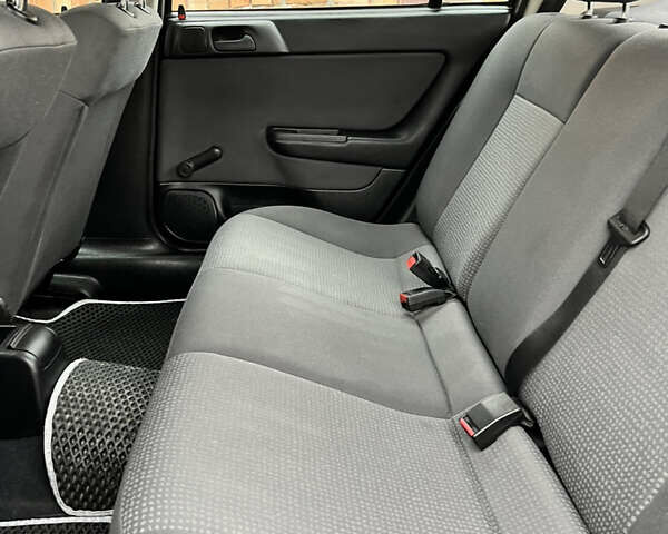 Черный Опель Астра, объемом двигателя 1.36 л и пробегом 82 тыс. км за 4000 $, фото 15 на Automoto.ua