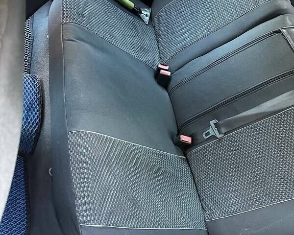 Черный Опель Астра, объемом двигателя 1.3 л и пробегом 227 тыс. км за 4600 $, фото 27 на Automoto.ua