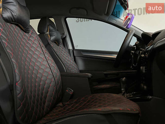 Черный Опель Астра, объемом двигателя 1.8 л и пробегом 224 тыс. км за 6999 $, фото 22 на Automoto.ua