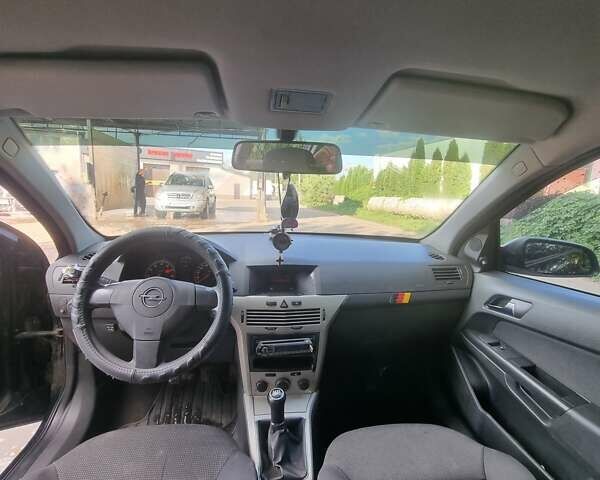 Черный Опель Астра, объемом двигателя 1.4 л и пробегом 254 тыс. км за 3700 $, фото 15 на Automoto.ua