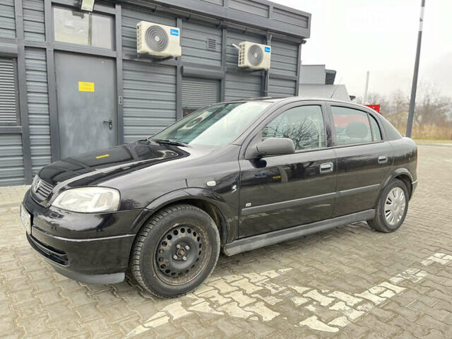 Черный Опель Астра, объемом двигателя 1.36 л и пробегом 82 тыс. км за 4000 $, фото 8 на Automoto.ua