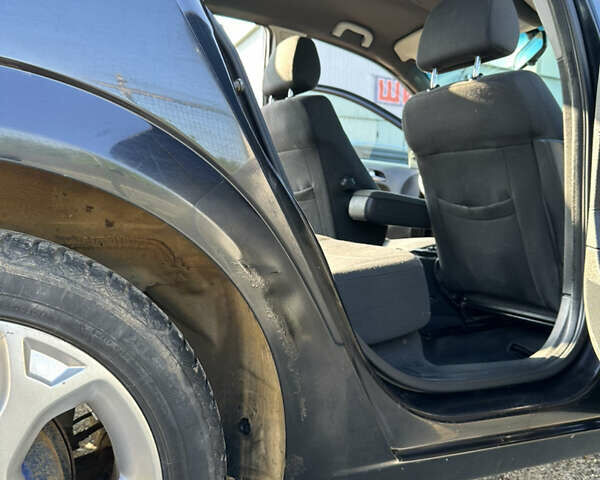 Черный Опель Астра, объемом двигателя 1.4 л и пробегом 344 тыс. км за 3700 $, фото 28 на Automoto.ua