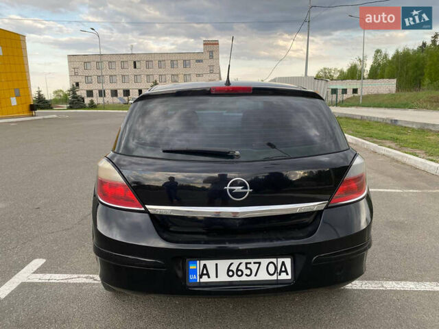 Черный Опель Астра, объемом двигателя 1.36 л и пробегом 258 тыс. км за 4200 $, фото 2 на Automoto.ua