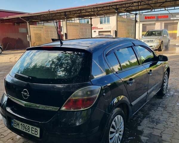 Черный Опель Астра, объемом двигателя 1.4 л и пробегом 254 тыс. км за 3700 $, фото 12 на Automoto.ua