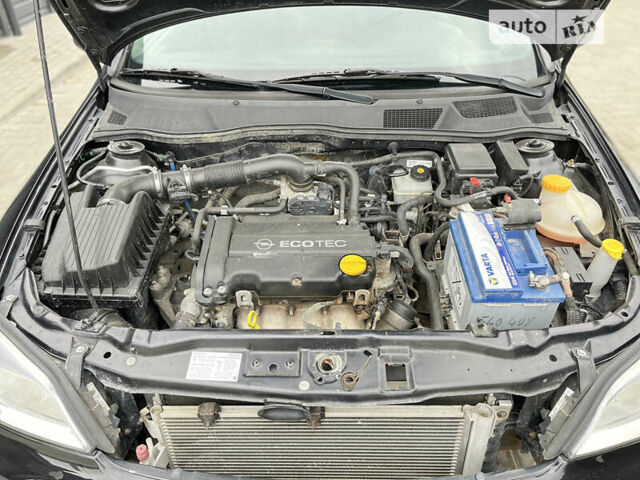 Черный Опель Астра, объемом двигателя 1.36 л и пробегом 82 тыс. км за 4000 $, фото 10 на Automoto.ua