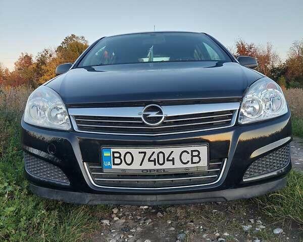 Черный Опель Астра, объемом двигателя 1.25 л и пробегом 268 тыс. км за 5000 $, фото 9 на Automoto.ua