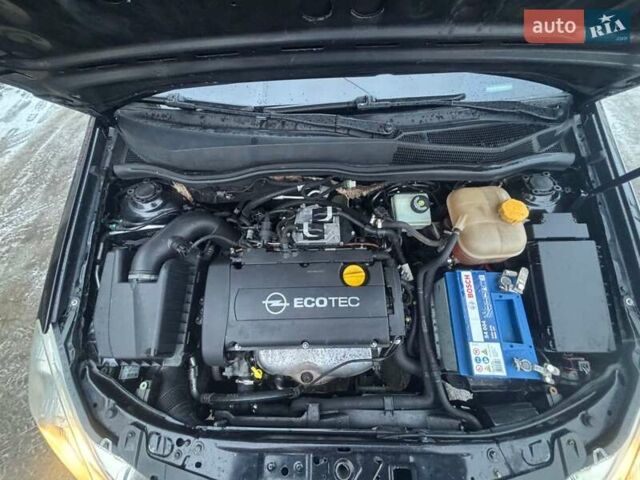 Черный Опель Астра, объемом двигателя 1.6 л и пробегом 247 тыс. км за 4499 $, фото 31 на Automoto.ua