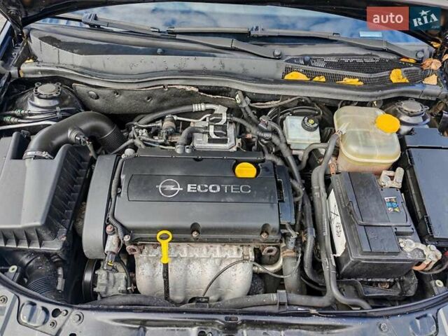 Черный Опель Астра, объемом двигателя 1.6 л и пробегом 194 тыс. км за 5300 $, фото 28 на Automoto.ua