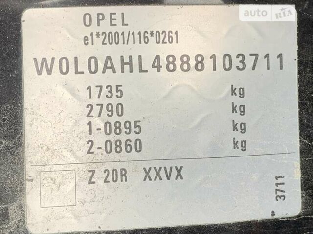 Черный Опель Астра, объемом двигателя 1.4 л и пробегом 98 тыс. км за 6900 $, фото 2 на Automoto.ua