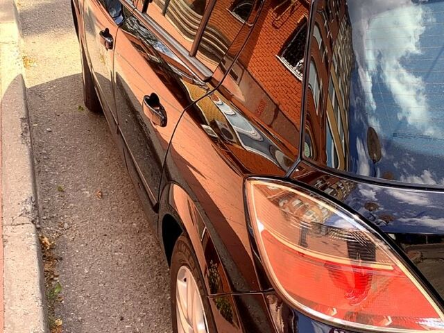 Черный Опель Астра, объемом двигателя 1.4 л и пробегом 187 тыс. км за 5999 $, фото 3 на Automoto.ua