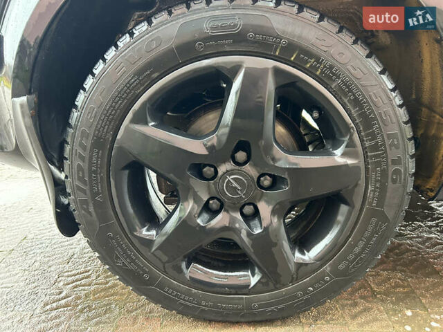 Черный Опель Астра, объемом двигателя 1.4 л и пробегом 220 тыс. км за 4350 $, фото 7 на Automoto.ua