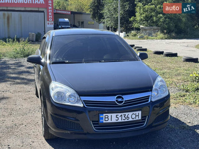 Черный Опель Астра, объемом двигателя 1.4 л и пробегом 223 тыс. км за 4599 $, фото 1 на Automoto.ua