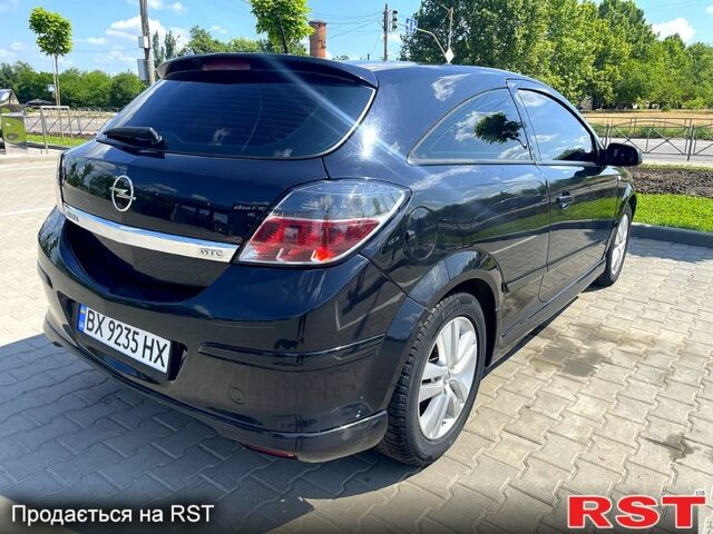 Черный Опель Астра, объемом двигателя 1.2 л и пробегом 300 тыс. км за 5000 $, фото 6 на Automoto.ua