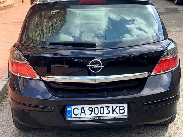 Черный Опель Астра, объемом двигателя 1.4 л и пробегом 187 тыс. км за 5999 $, фото 1 на Automoto.ua