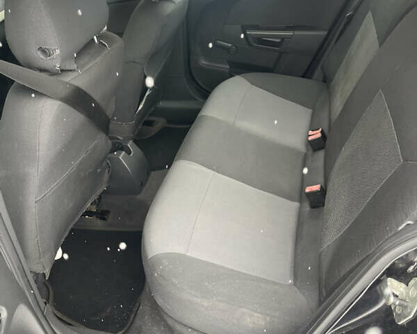 Черный Опель Астра, объемом двигателя 1.6 л и пробегом 210 тыс. км за 3850 $, фото 16 на Automoto.ua