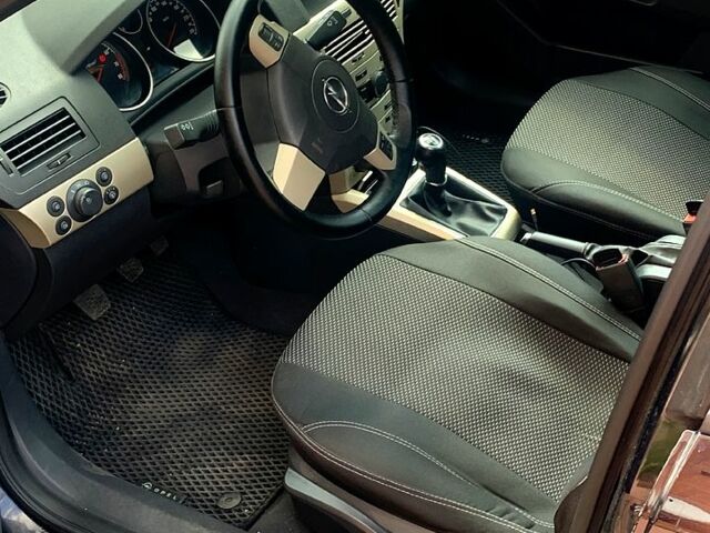 Черный Опель Астра, объемом двигателя 1.4 л и пробегом 187 тыс. км за 5999 $, фото 4 на Automoto.ua