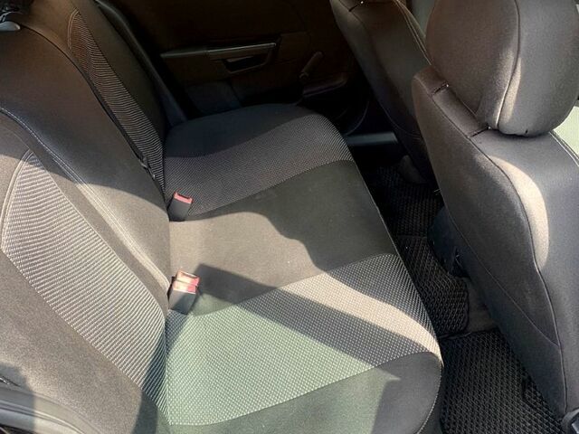 Черный Опель Астра, объемом двигателя 1.4 л и пробегом 187 тыс. км за 5999 $, фото 6 на Automoto.ua