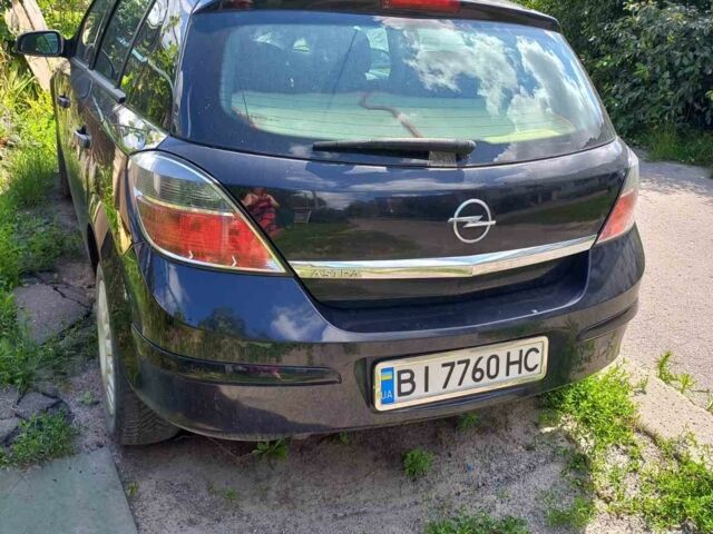 Черный Опель Астра, объемом двигателя 1.6 л и пробегом 214 тыс. км за 5100 $, фото 2 на Automoto.ua