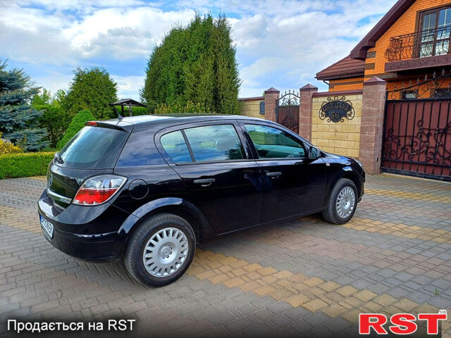 Черный Опель Астра, объемом двигателя 1.4 л и пробегом 211 тыс. км за 6000 $, фото 2 на Automoto.ua