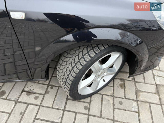 Черный Опель Астра, объемом двигателя 1.6 л и пробегом 245 тыс. км за 5650 $, фото 23 на Automoto.ua