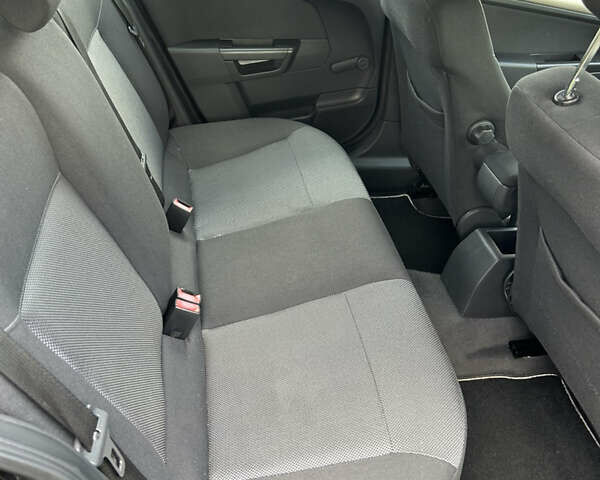 Черный Опель Астра, объемом двигателя 1.6 л и пробегом 233 тыс. км за 5900 $, фото 7 на Automoto.ua