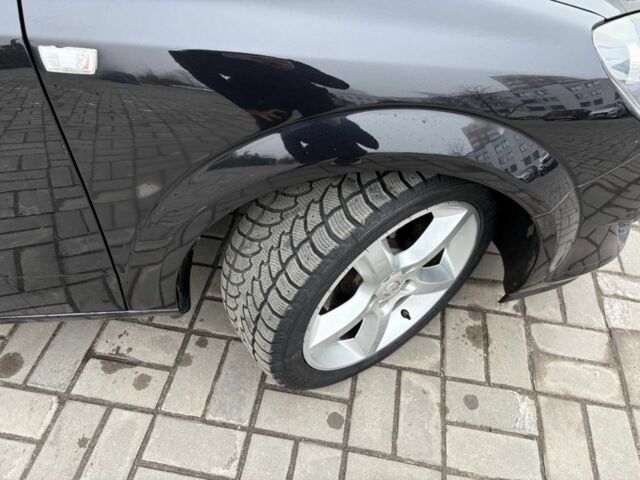 Черный Опель Астра, объемом двигателя 1.6 л и пробегом 246 тыс. км за 5650 $, фото 3 на Automoto.ua